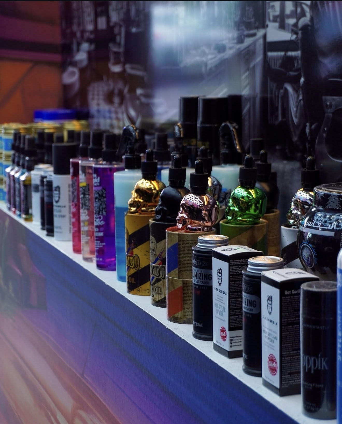 Barber Parlour product shelf — pomades, oils, clays and sprays